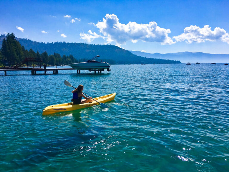 Travel Lemming Writer Laura McFarland, kayaking on a sunny day in Kings Beach