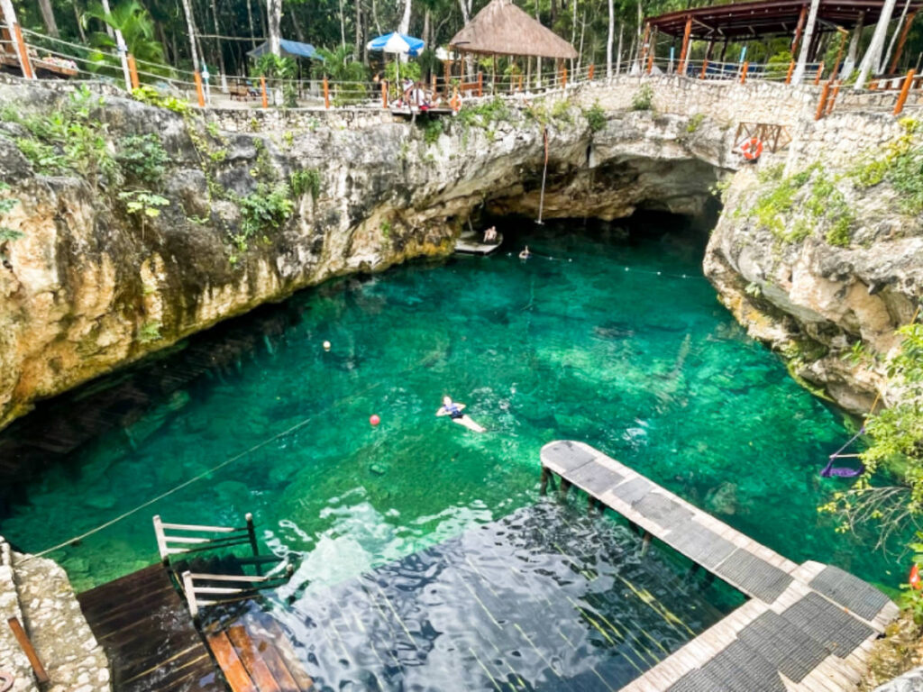 The author Laura Falin swimming in a cenote