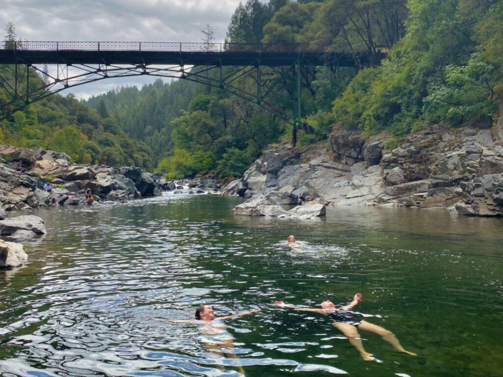 The author Laura McFarland with her friends at the Yuba River