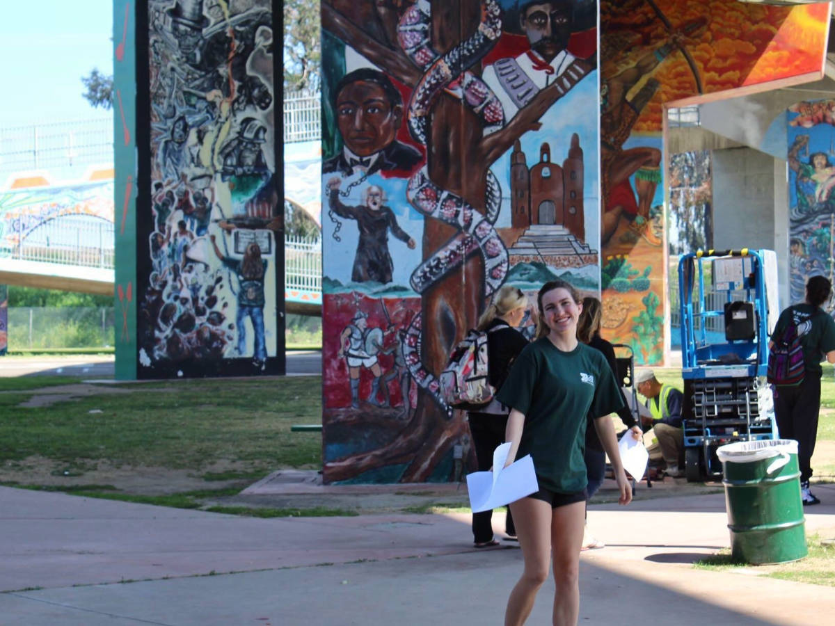 Travel Lemming writer Laura at the Chicano Park Murals