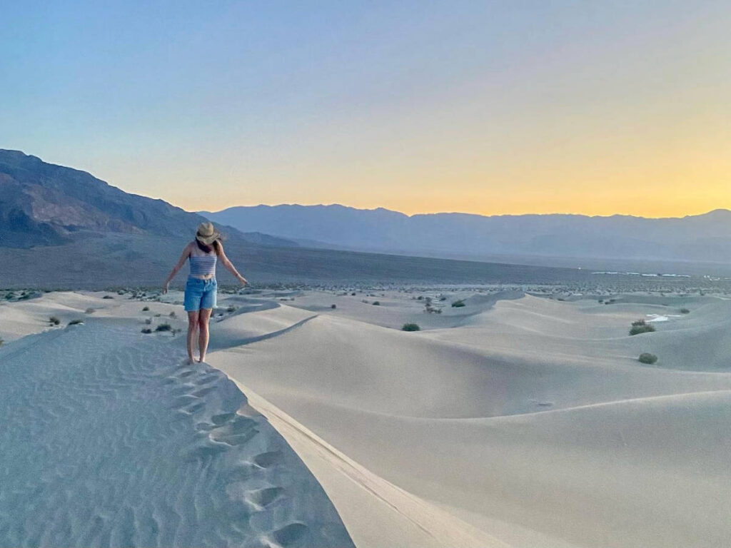 The author Laura McFarland walking around the Mesquite Flat Sand Dunes