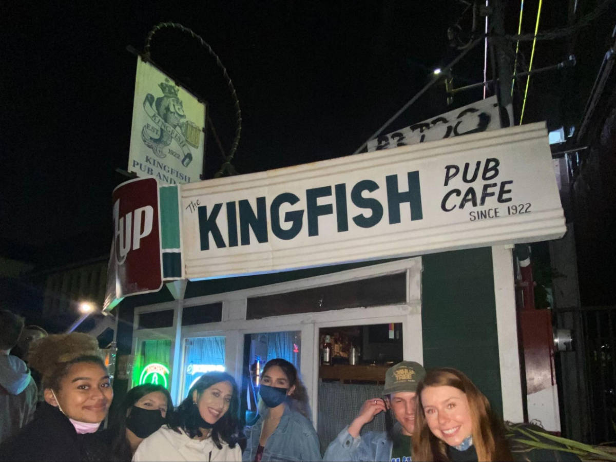 Travel Lemming's writer Laura McFarland's friends, outside Kingfish Pub and Cafe at night