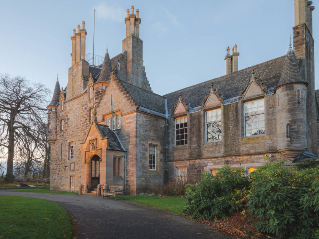 The sunset reflecting on the facade of the Lauriston Castle