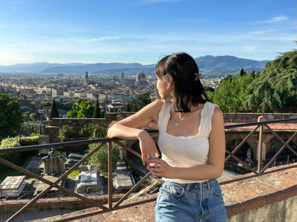 The author Lea Rose enjoying the overlooking view of Florence