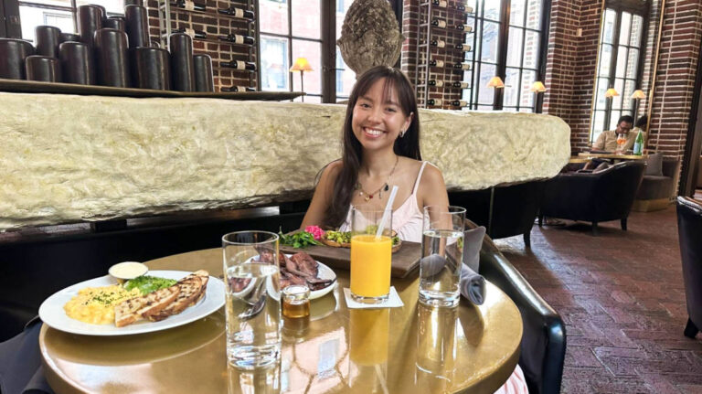 The author Lea Rose Allbaugh dining at 3 Arts Club Cafe