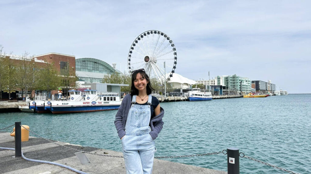 The author, Lea Rose Allbaugh smiling for a photo at Chicago’s Navy Pier