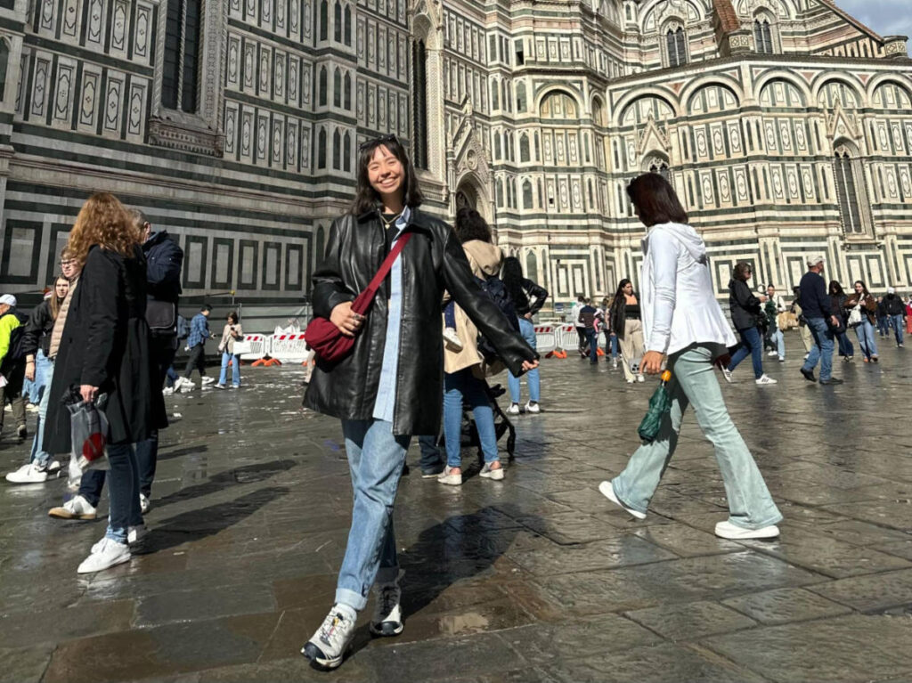 The author Lea Rose Allbaugh, posing for a photo outside the Cathedral of Santa Maria del Fiore