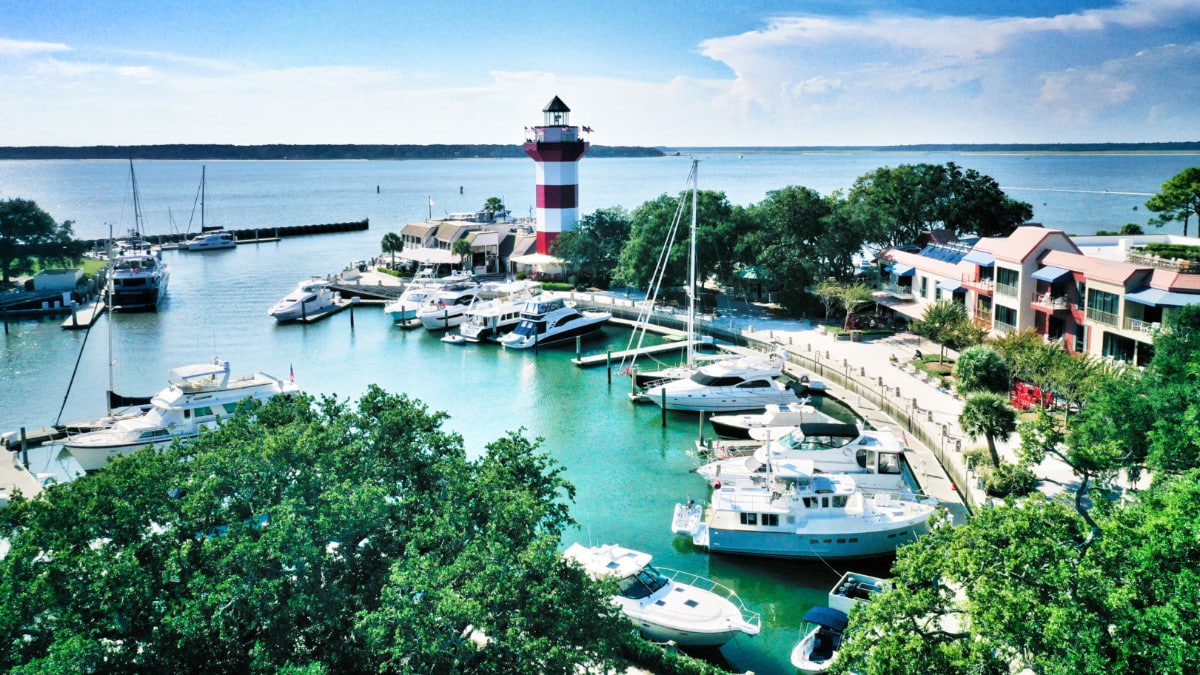 View of the docked boats and the lighthouse in Hilton Head Island