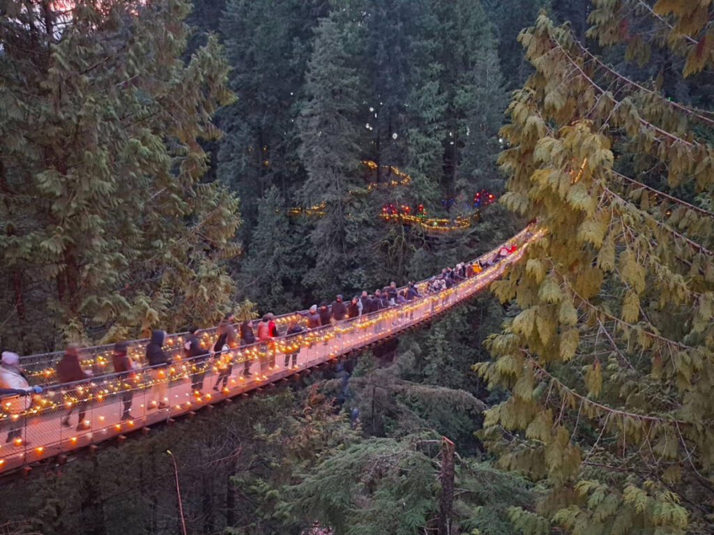 View of the lights around the magical Capilano Suspension Bridge at dusk