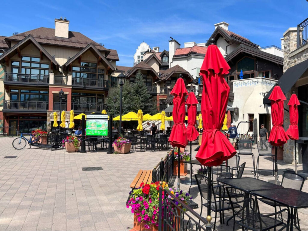 View of the vibrant umbrellas in the Lionshead Village on a sunny day