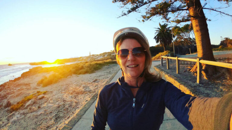 The author Lisa Ikin, enjoying the sunset views on Rottnest Island while on her bicycle