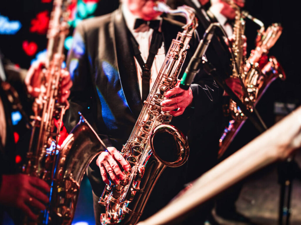 View of the musicians playing the saxophone