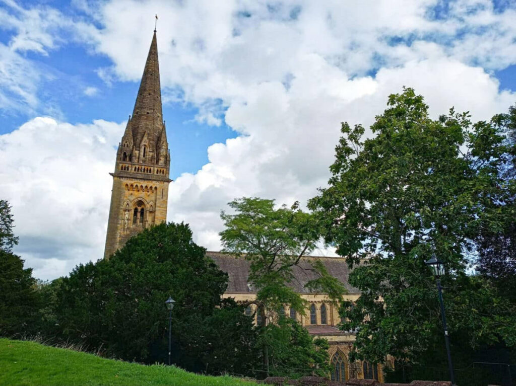 View of the top of Llandaff Cathedral seen from the vast lawn