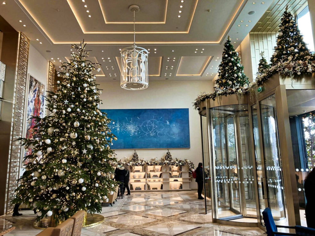 View of the Christmas trees and decorations at the lobby of the Cheval Blanc Hotel
