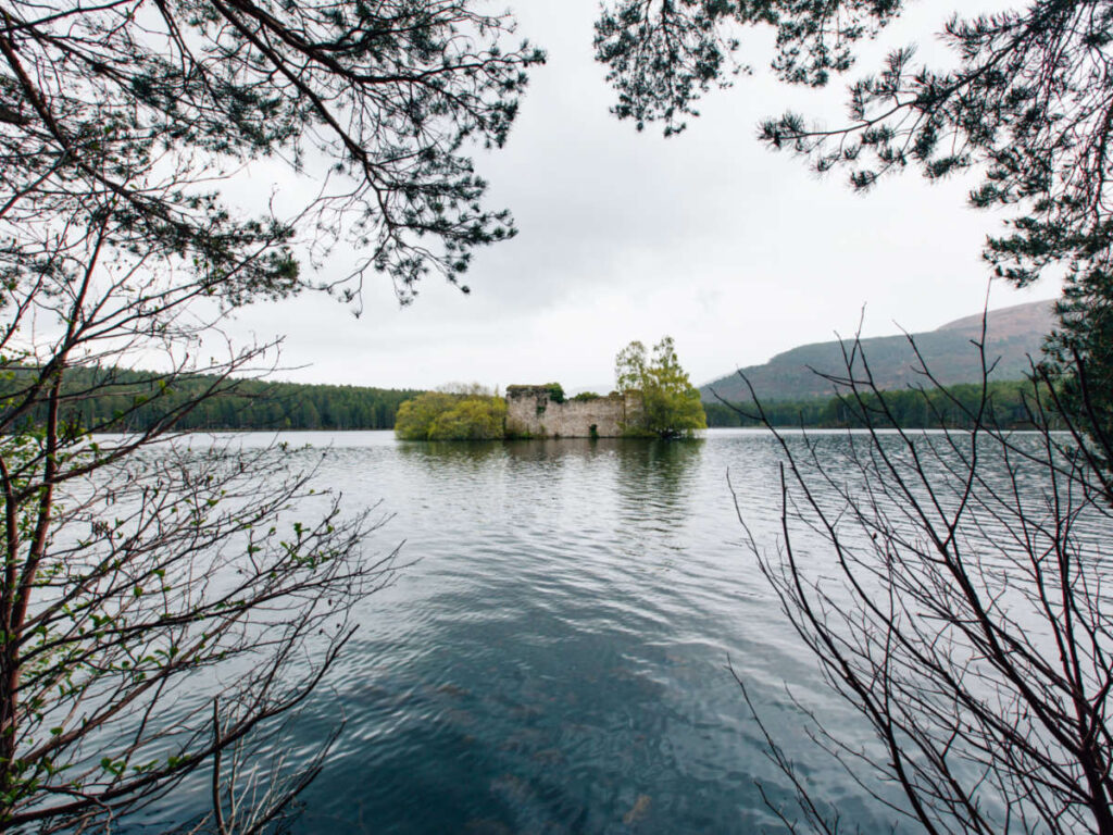 View of the Loch an Eilein Castle in the middle of the lake