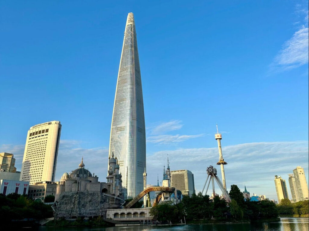 View of the Lotte World Tower against a clear blue sky