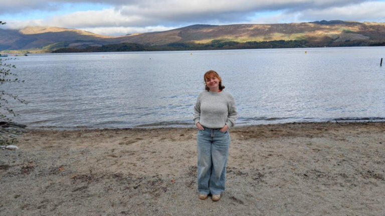 The author Louise Wylie on the shores of Loch Lomond in autumn