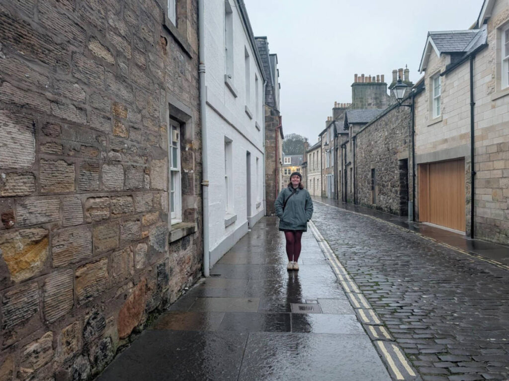 The author, Louise Wylie wandering on a street of St Andrews