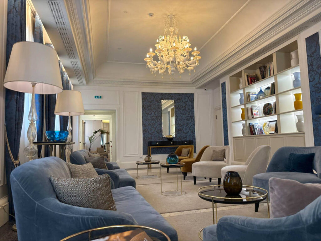 View of the modern interior of the lounge area of H10 Palazzo Canova