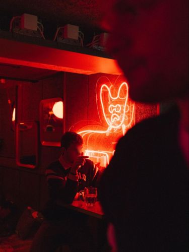 A man enjoying a drink at Lykke Live