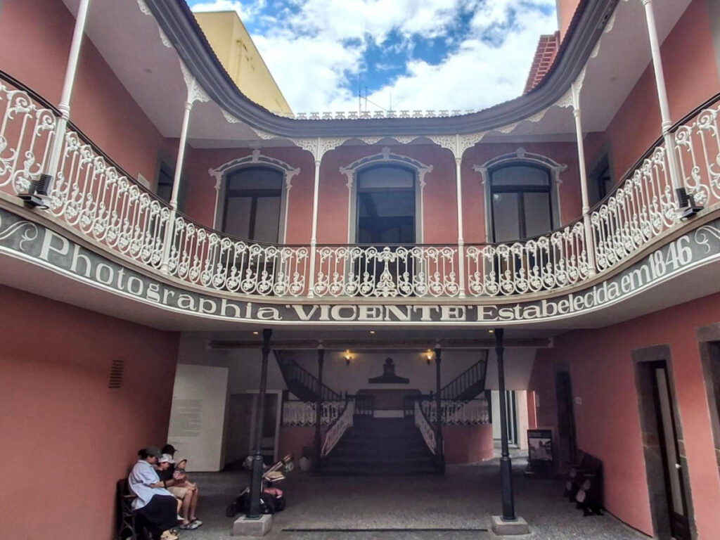 People sitting outside the Madeira Photography Museum