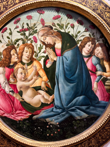 Closeup look of the painting Madonna of the Roses by Botticelli