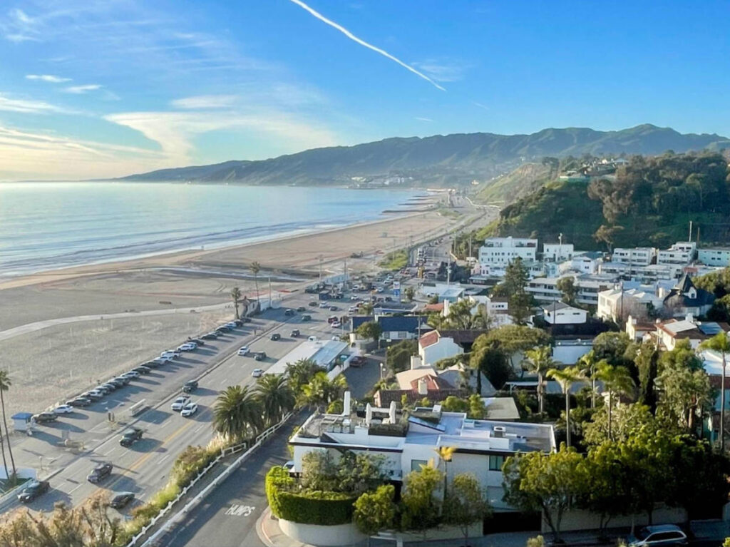 Overlooking view of the Malibu beach surrounded by greenery