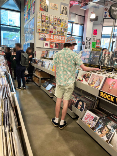 A man checking out the vinyl records at the Amoeba Records