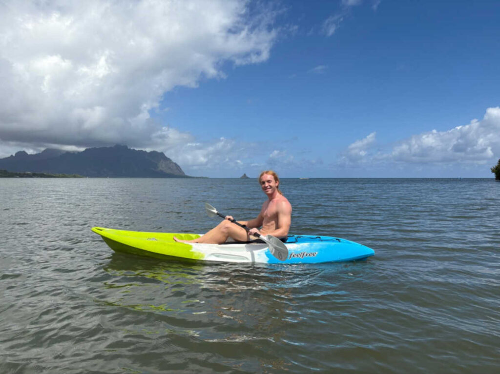 A man kayaking on Kaneohe Bay