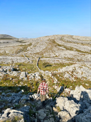A man hiking down the Burren National Park