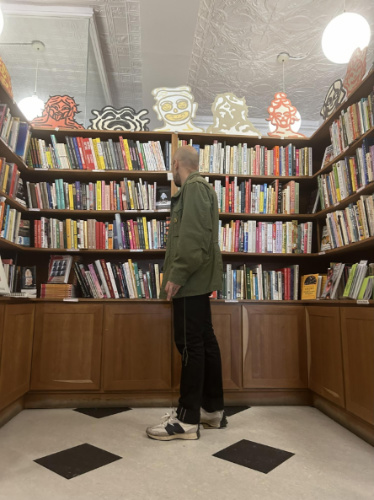 The author's husband on a bookstore