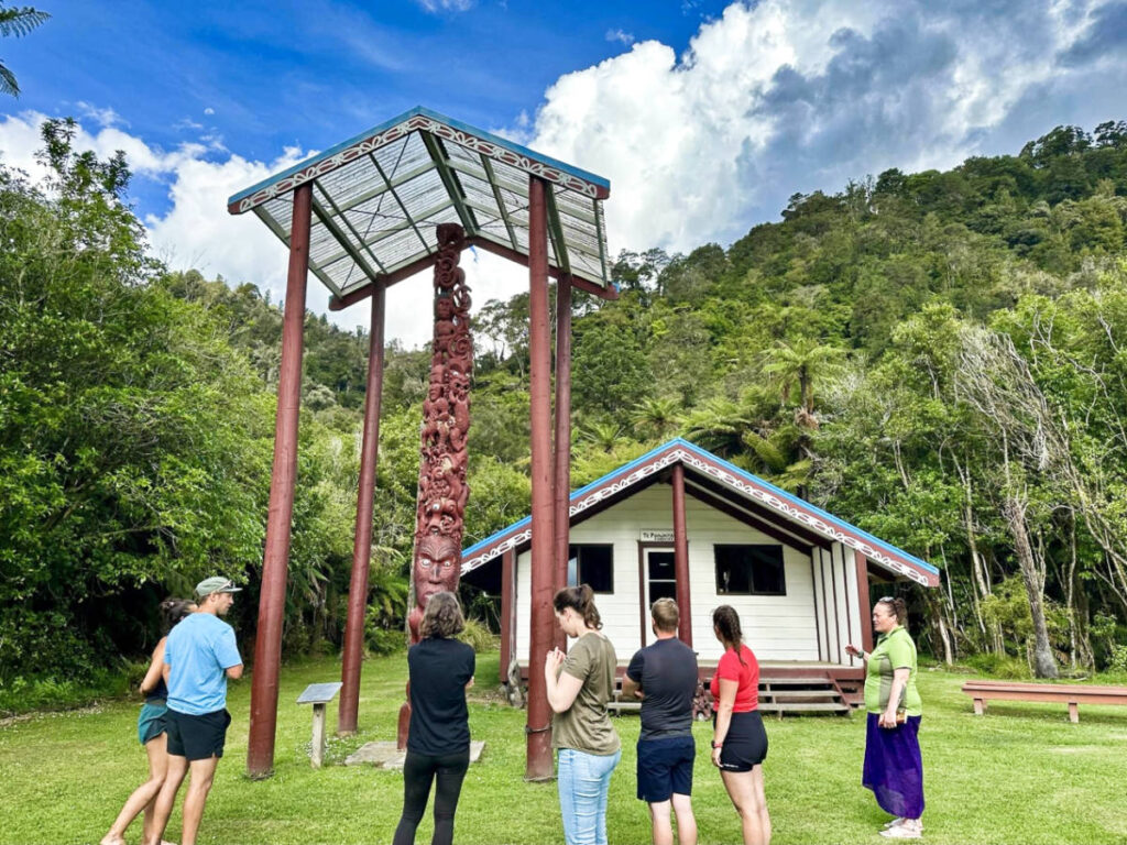 The tourists in front of the Māori Marae