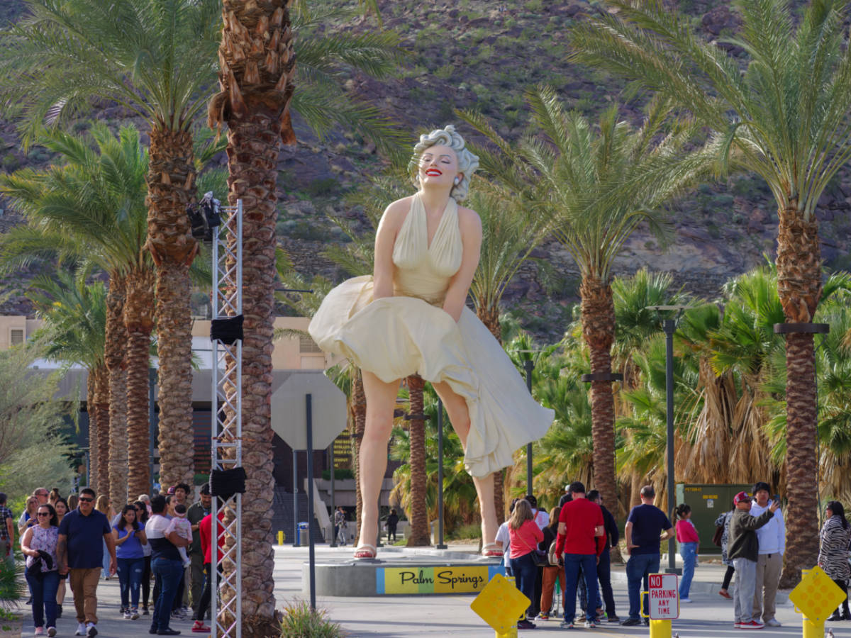 Crowds of people visiting the Marilyn Statue in downtown Palm Springs