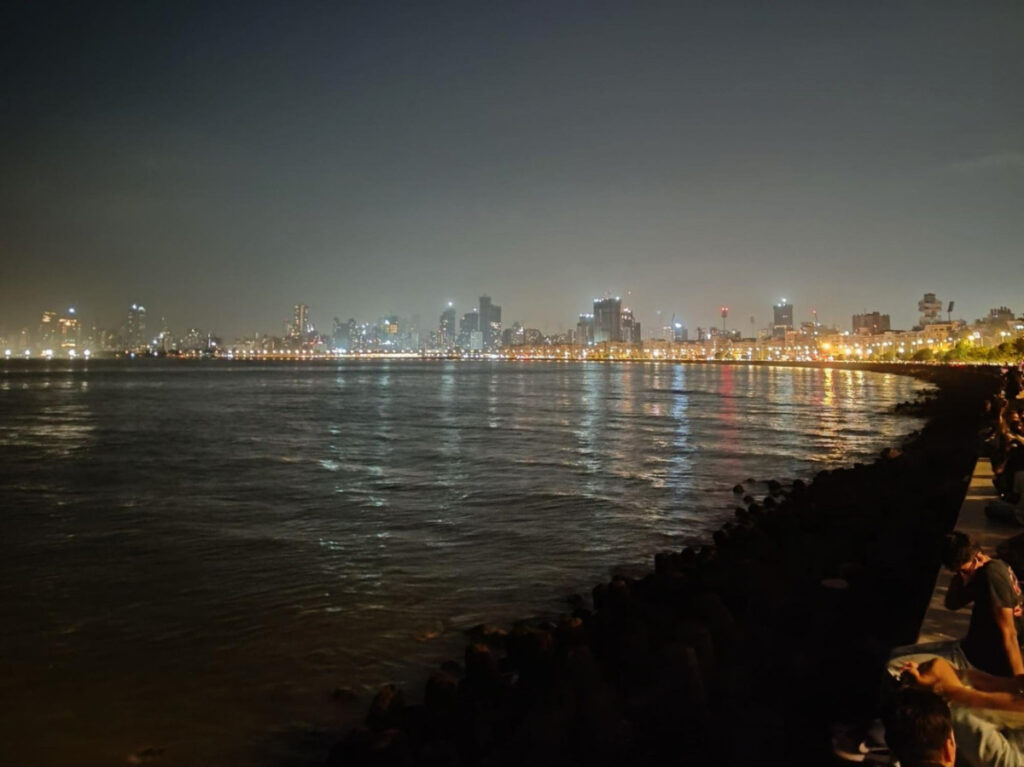 Scenic view of the illuminated curvature of Marine Drive at night