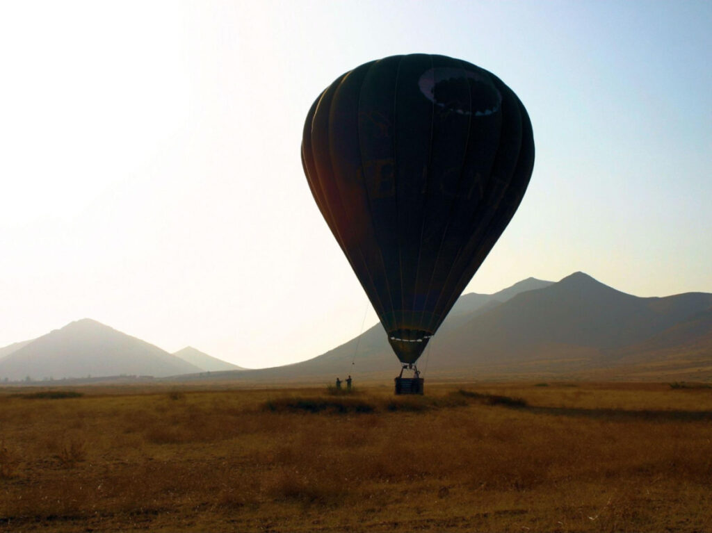 View of the Marrakesh plains behind a hot air balloon