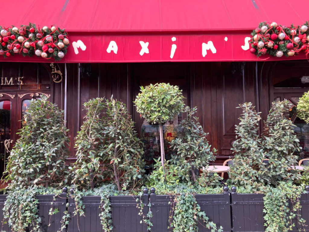 View of the greenery around the exterior of Maxim’s Restaurant
