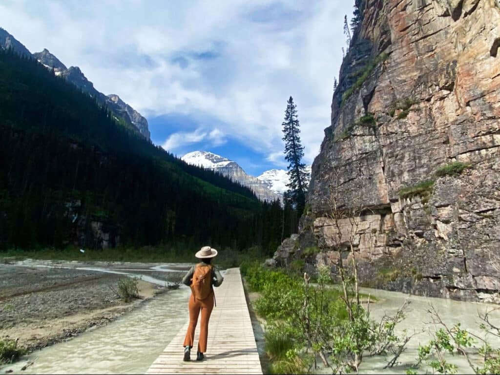 The author McKenna Mobley, posing for a photo on her hike to the Victoria Glacier