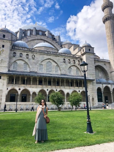 The author McKenna Mobley, posing in front of the Fatih Mosque