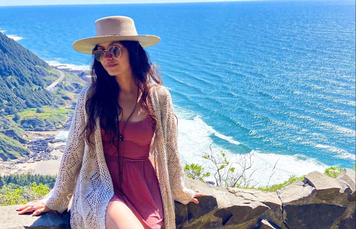 Travel Lemming Writer, McKenna posing at the Coastal Viewpoint