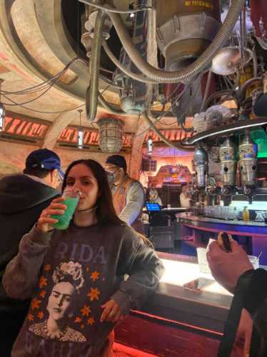 The author, McKenna Mobley enjoying her drink at Olga’s Cantina