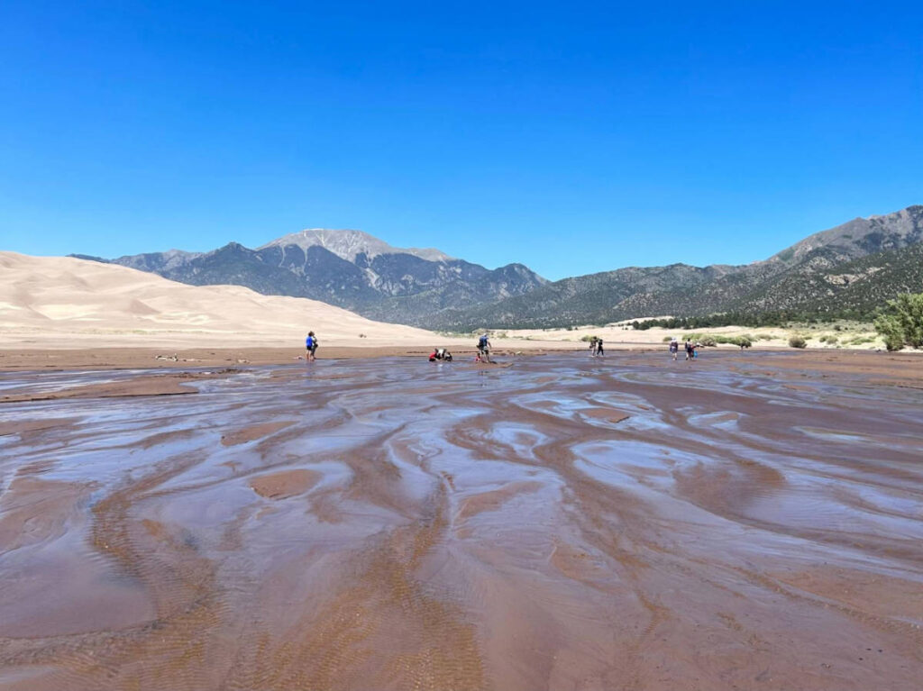 View of people at the Medano Creek
