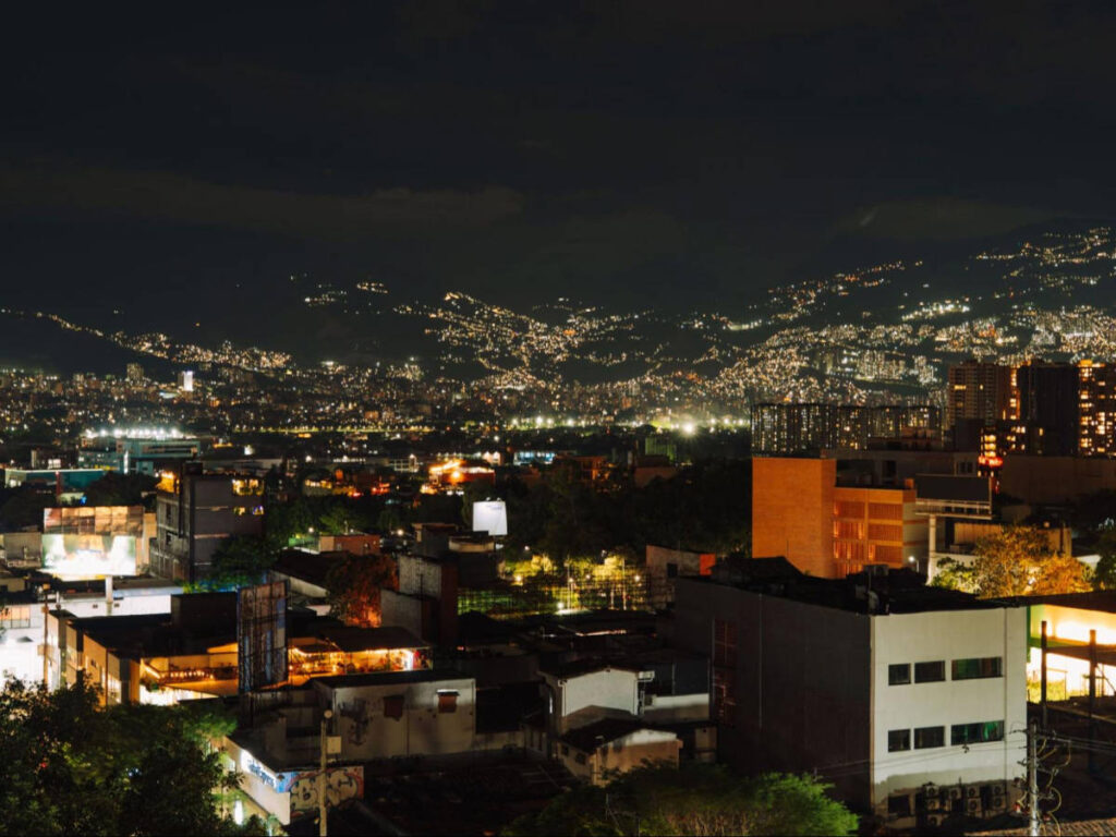 Panoramic view of the illuminated skyline of Medellín at night