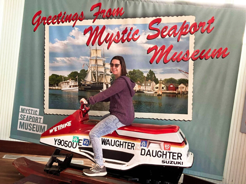 The author Meg O'Connor riding on a wetbike at Mystic Seaport Museum