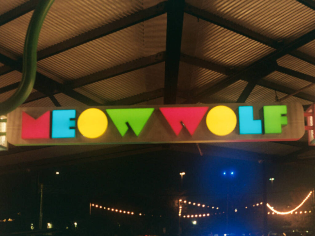 View of the colorful signage of Meow Wolf