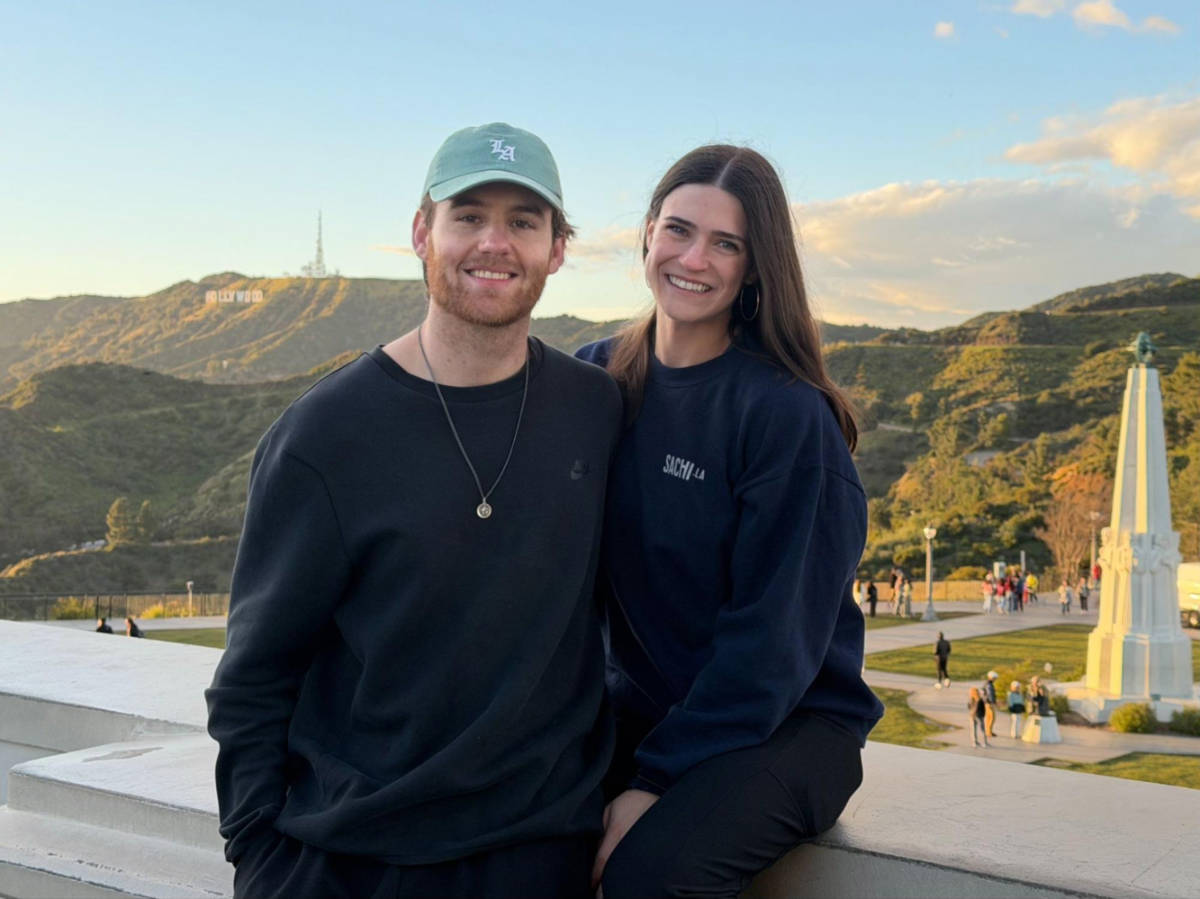 Travel Lemming writer, Betty Hurd and her boyfriend Michael, posing for a photo at the Griffith Observatory
