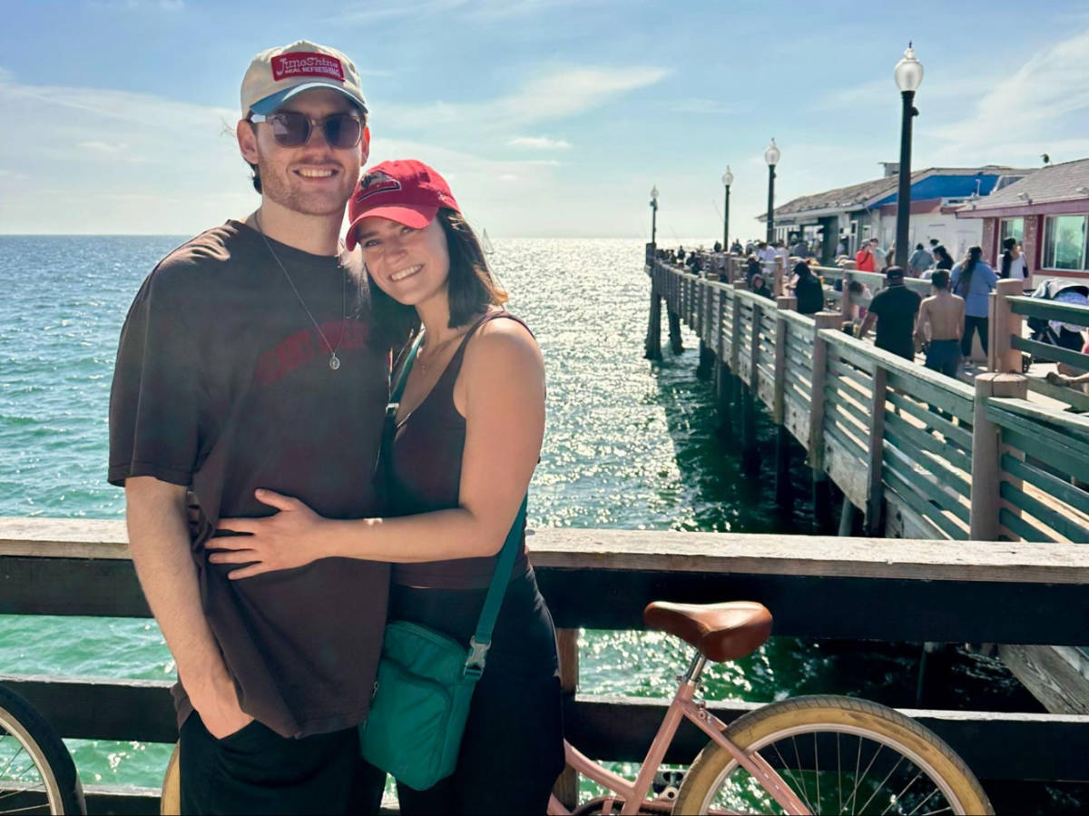 Travel Lemming writer, Betty Hurd and her boyfriend Michael, posing for a photo at the boardwalk of Redondo Beach