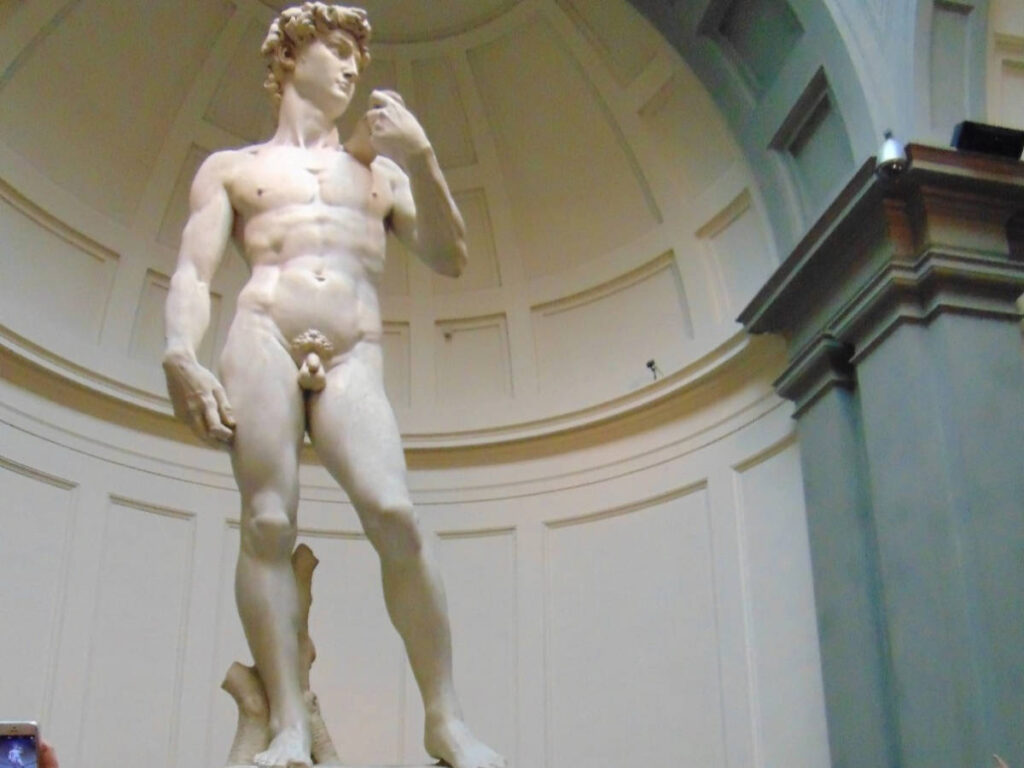 Closeup view of David by Michelangelo inside the Accademia Gallery