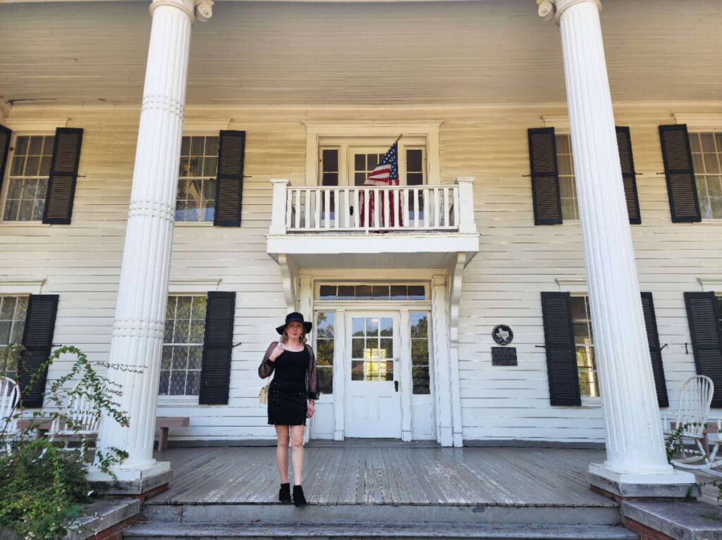 The author Sarah Heath in front of the Millermore Mansion