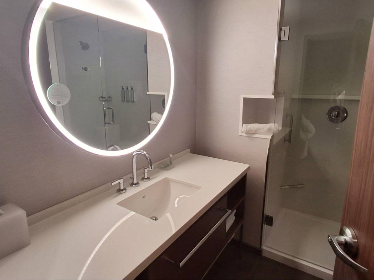 The modern bathroom in the room of Courtyard by Marriott Downtown Calgary