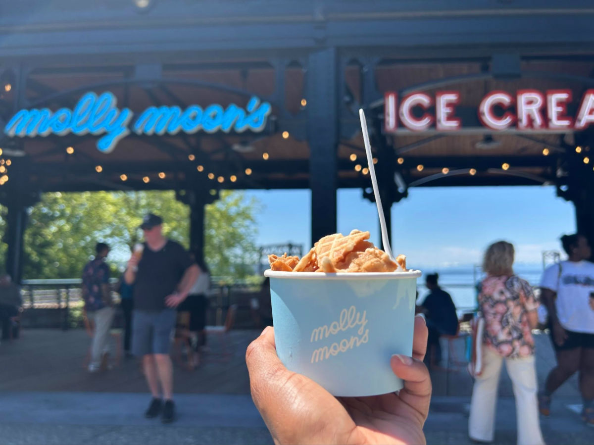 Holding a cup of Molly Moon’s Ice Cream